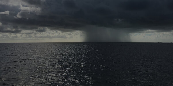 rain-falling-on-the-horizon-over-the-sea-photo-brian-cook.jpg