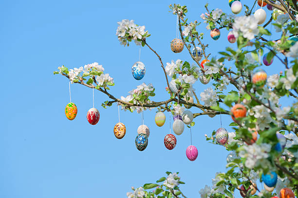 colorful-handmade-eastereggs-on-an-apple-tree.jpg