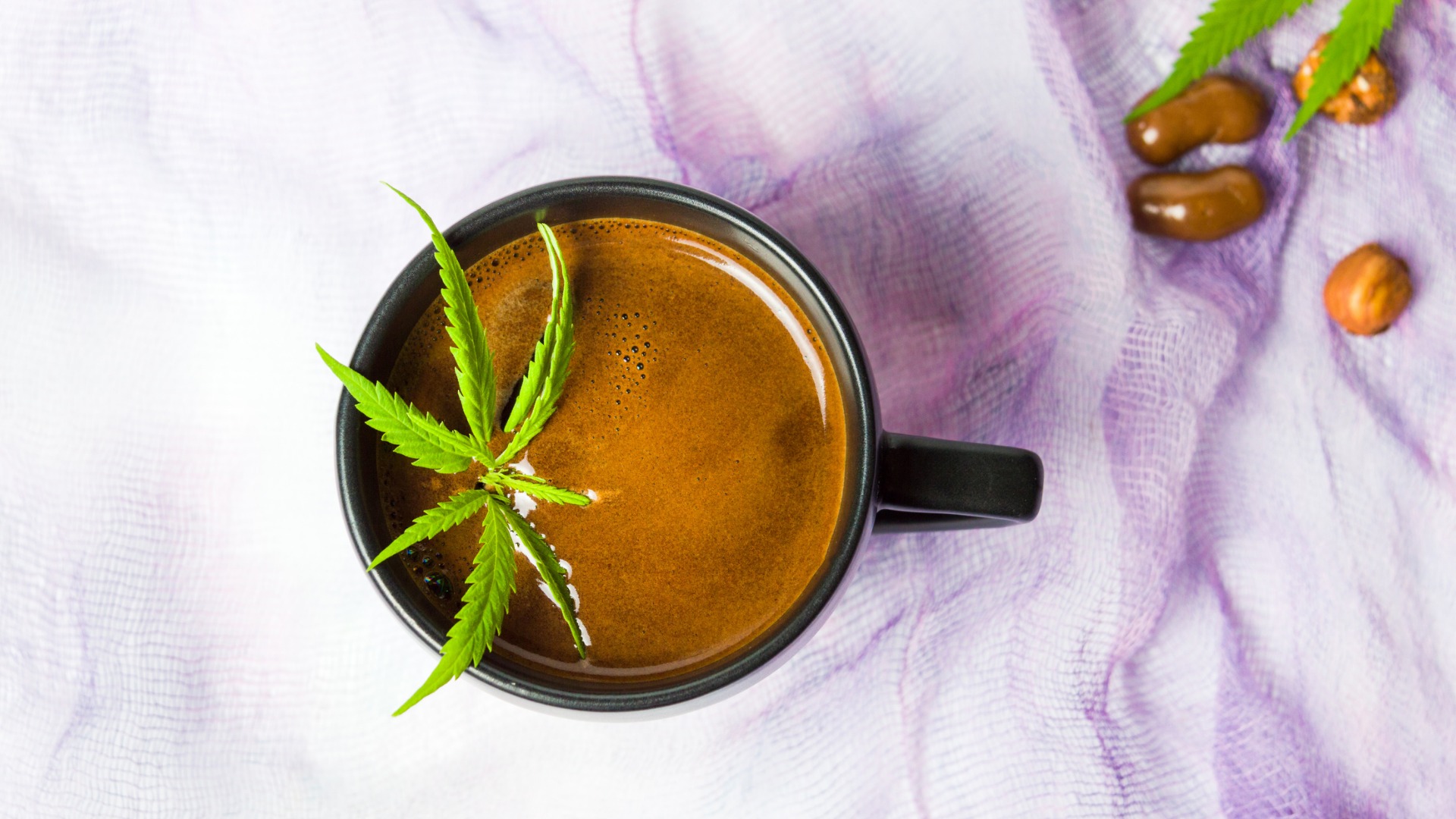 coffee-with-marijuana-leaf-top-view-picture-id1044675604.jpg