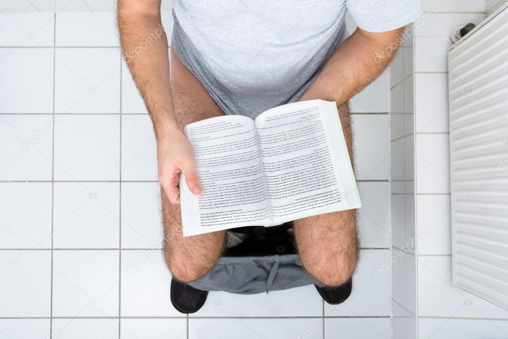 depositphotos_63914983-stock-photo-man-reading-book-in-toilet.jpg