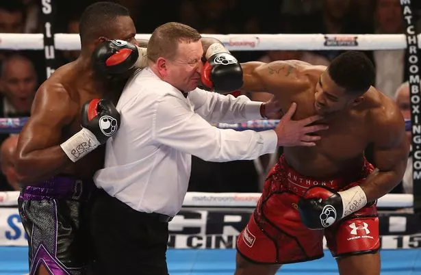Referee-Howard-Foster-tries-to-separate-Dillian-Whyte-and-Anthony-Joshua.jpg